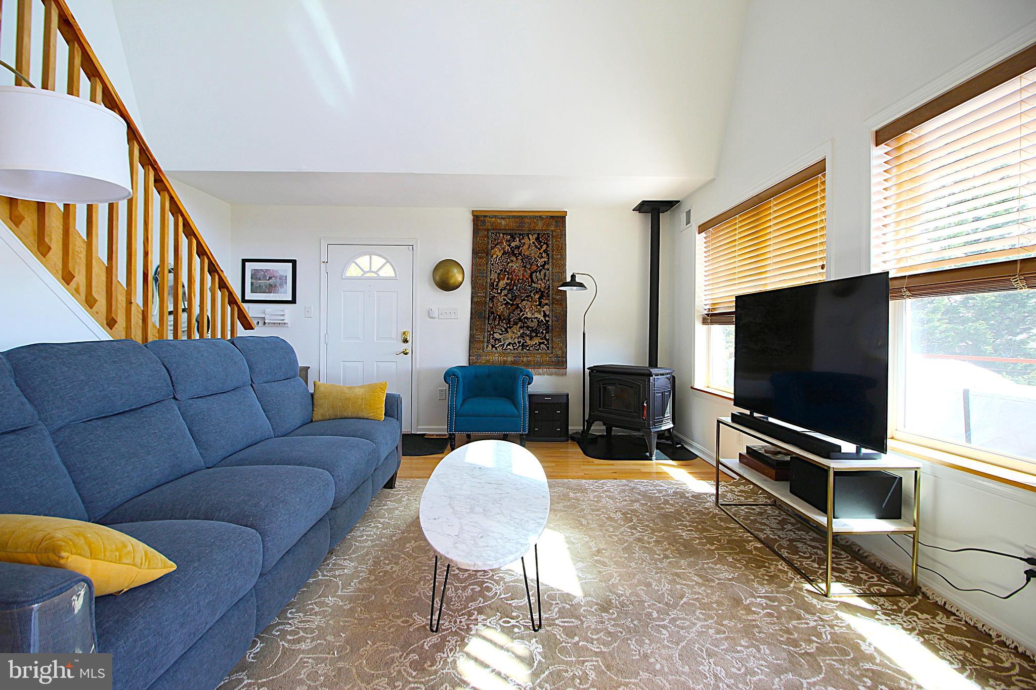 2602 Lookout Road Haymarket, VA 20169 - Photo 19 of 32 a living room with furniture and a flat screen tv