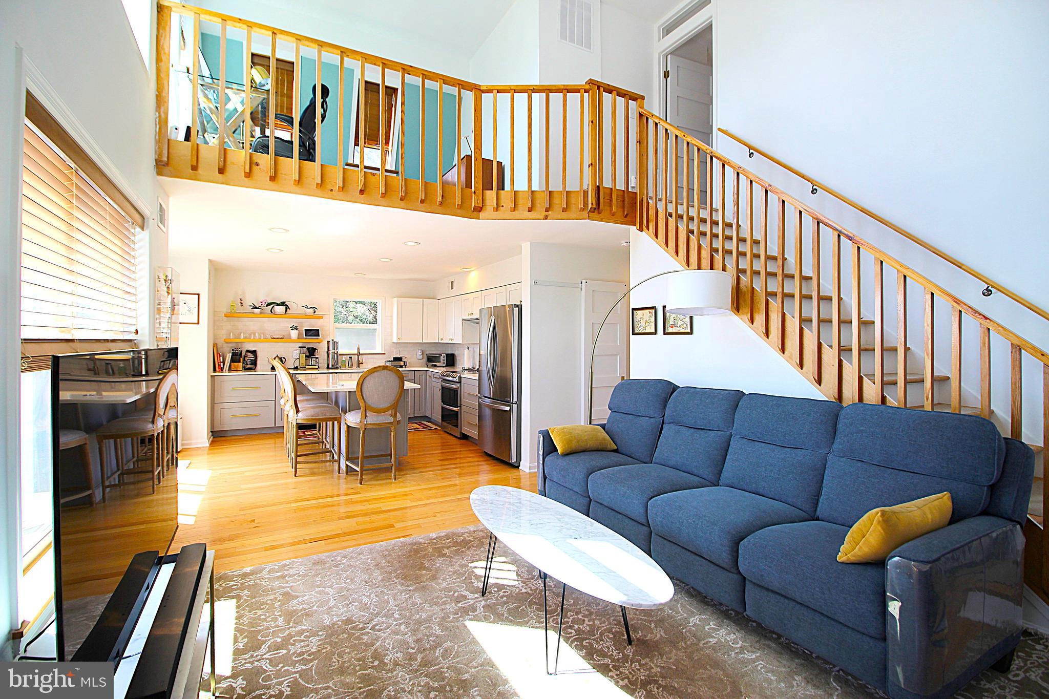 2602 Lookout Road Haymarket, VA 20169 - Photo 21 of 32 a living room with furniture and wooden floor