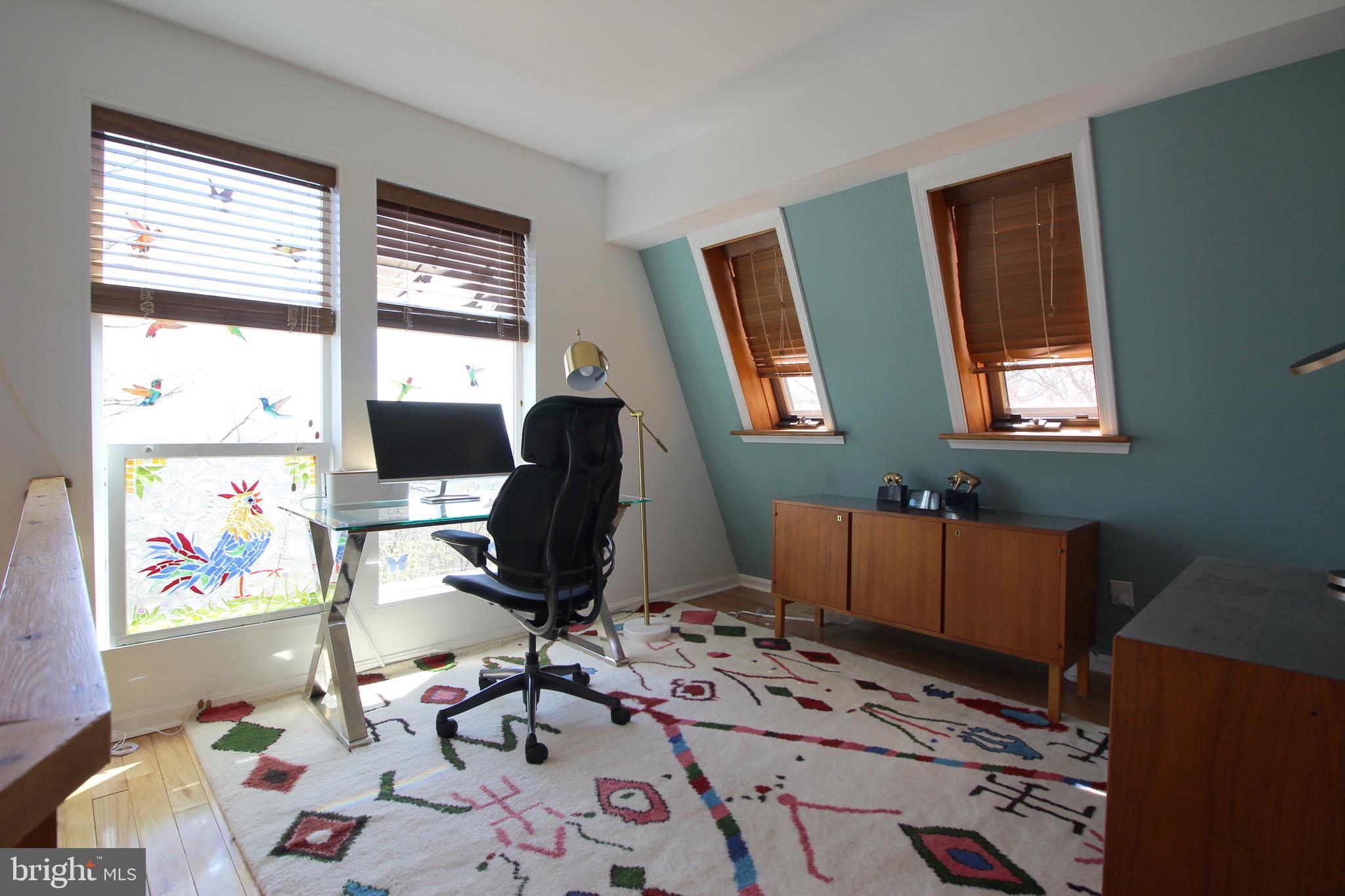2602 Lookout Road Haymarket, VA 20169 - Photo 23 of 32 a view of workspace with wooden floor windows