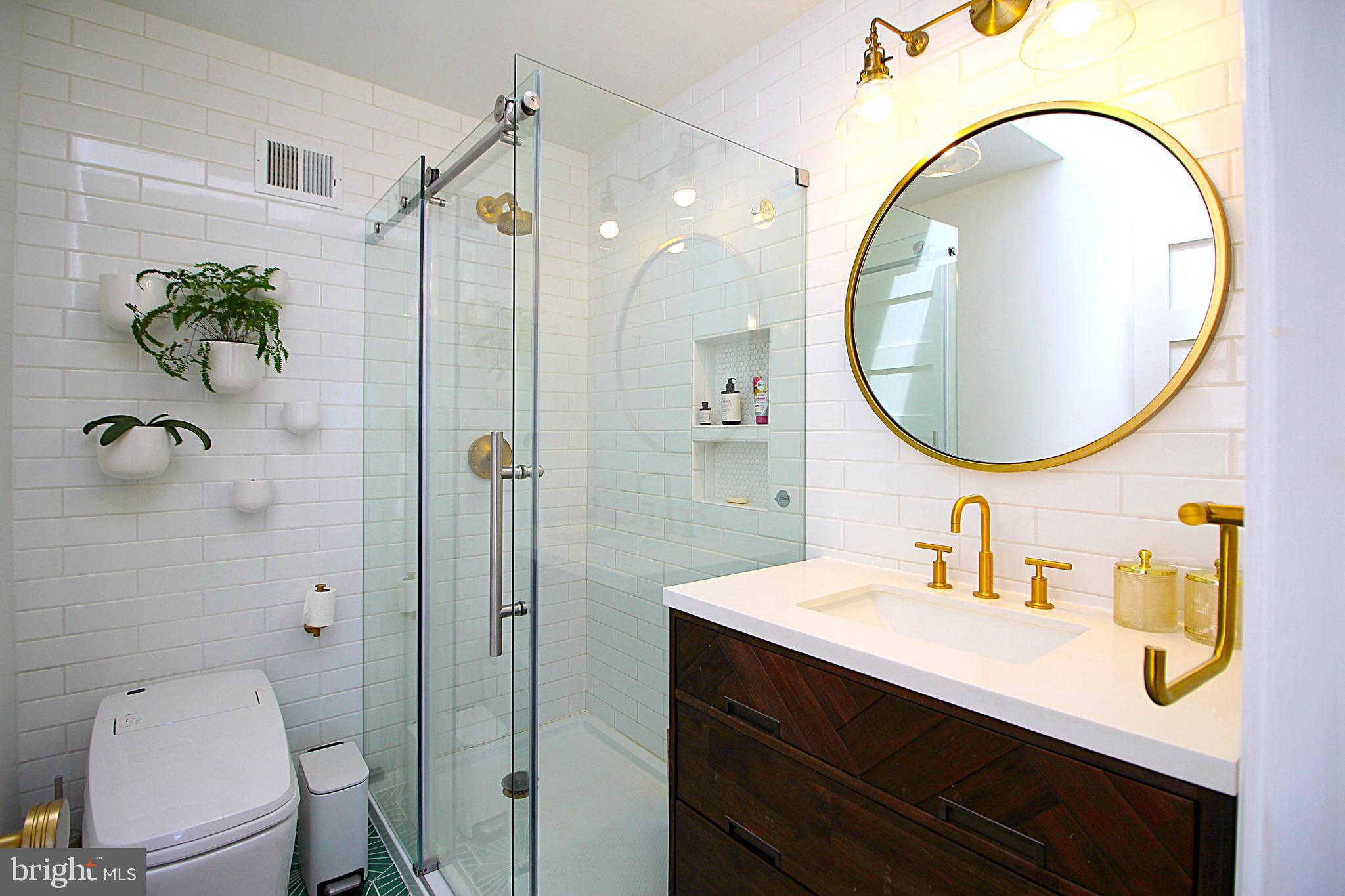 2602 Lookout Road Haymarket, VA 20169 - Photo 24 of 32 a bathroom with a sink mirror and toilet