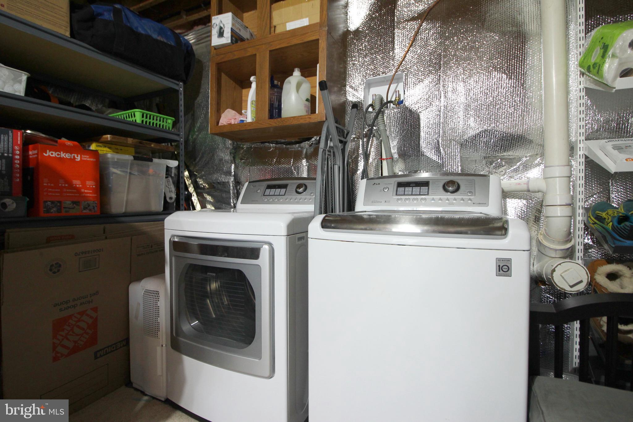 2602 Lookout Road Haymarket, VA 20169 - Photo 29 of 32 a utility room with dryer and washer