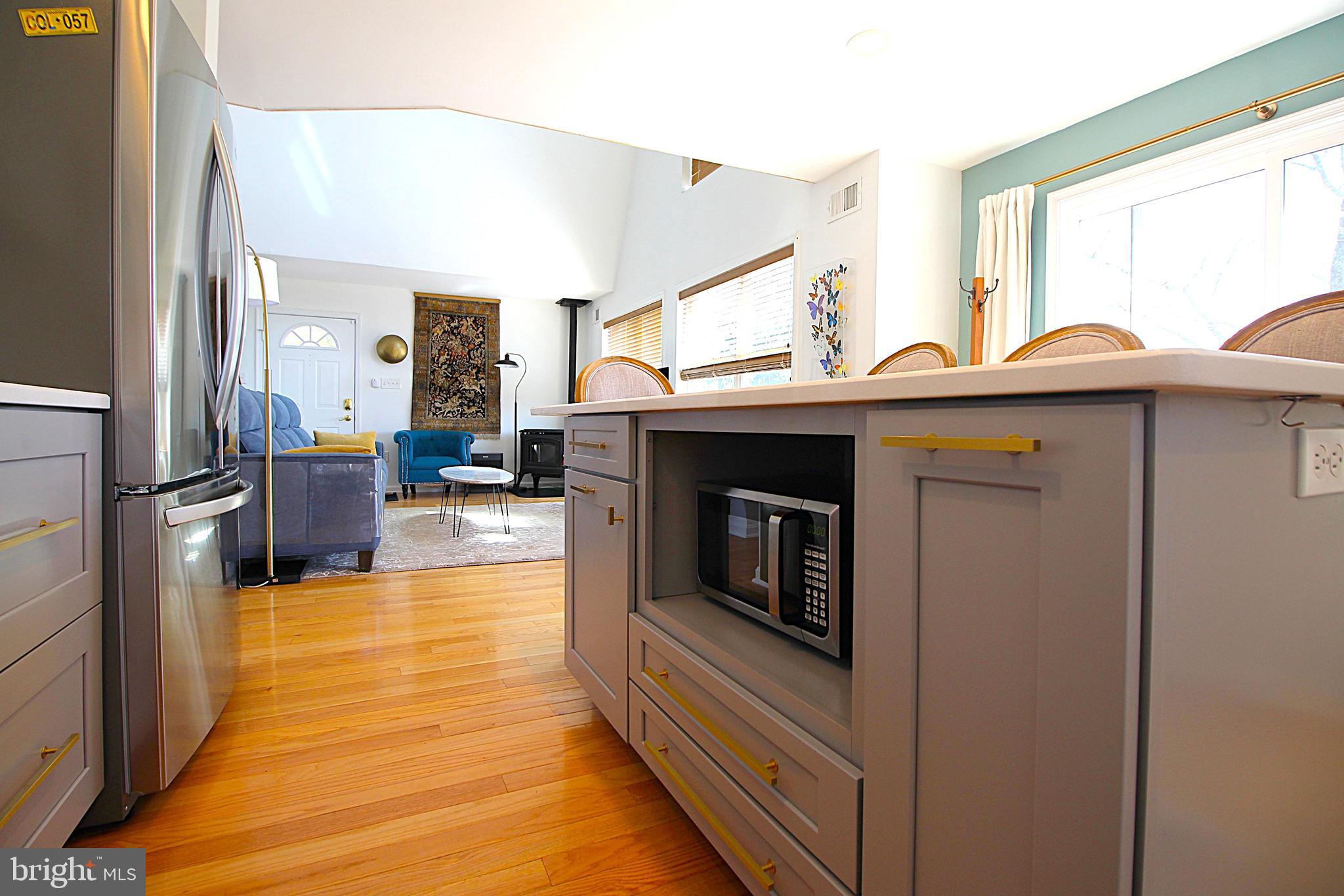 2602 Lookout Road Haymarket, VA 20169 - Photo 4 of 32 a kitchen with stainless steel appliances a stove top oven and cabinets