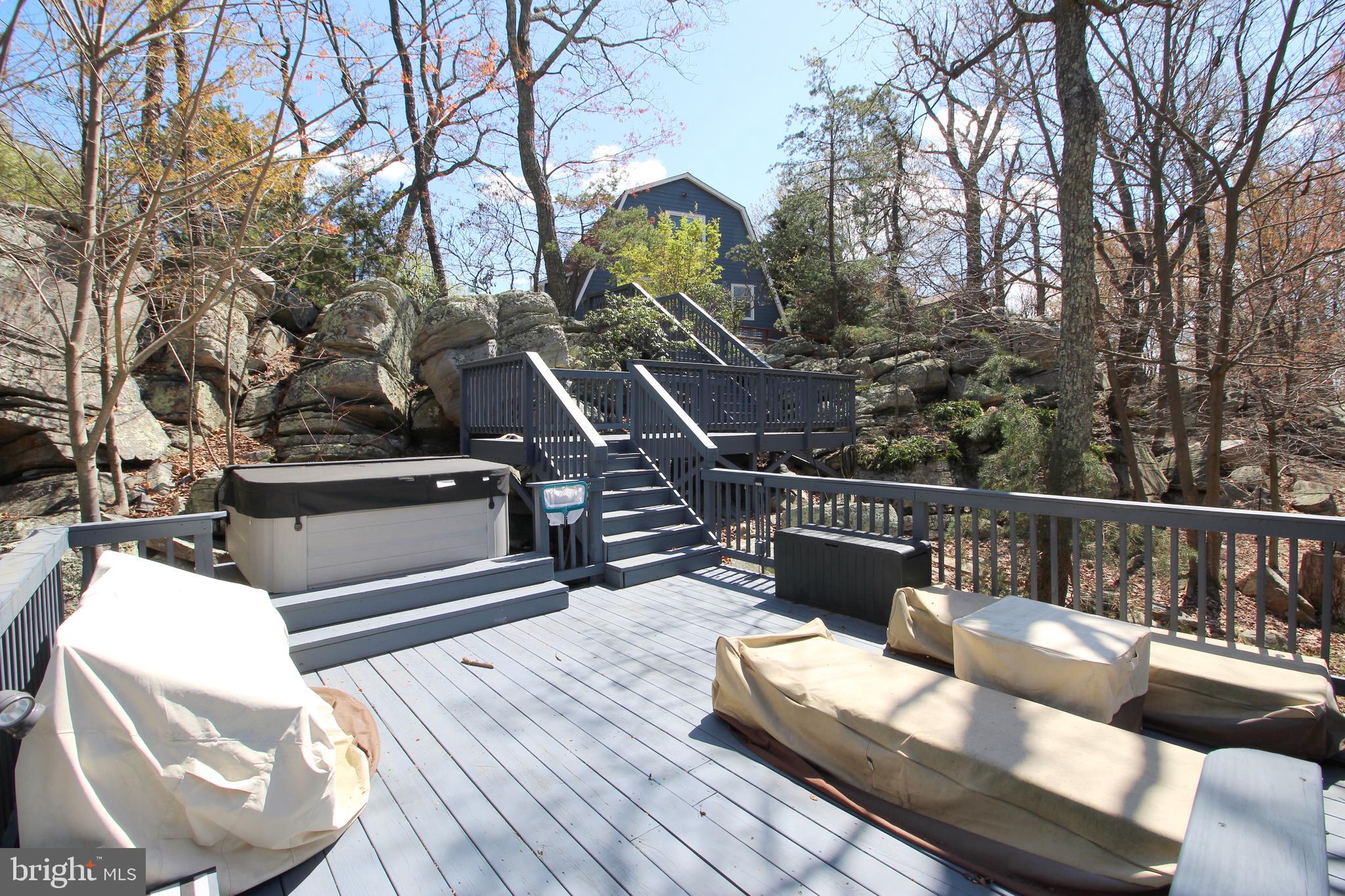 2602 Lookout Road Haymarket, VA 20169 - Photo 7 of 32 a view of a couches on the roof deck