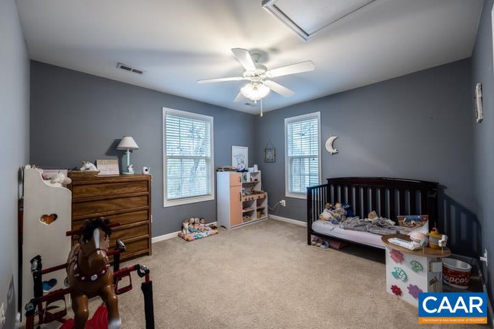 100 Roy's Place Charlottesville, VA 22902 - Photo 19 of 29 a bedroom with furniture and a window