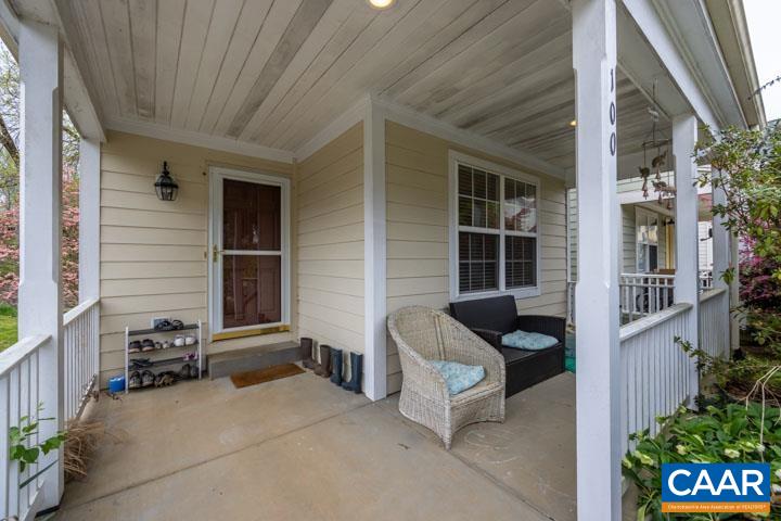 100 Roy's Place Charlottesville, VA 22902 - Photo 7 of 29 a front view of a house with outdoor seating