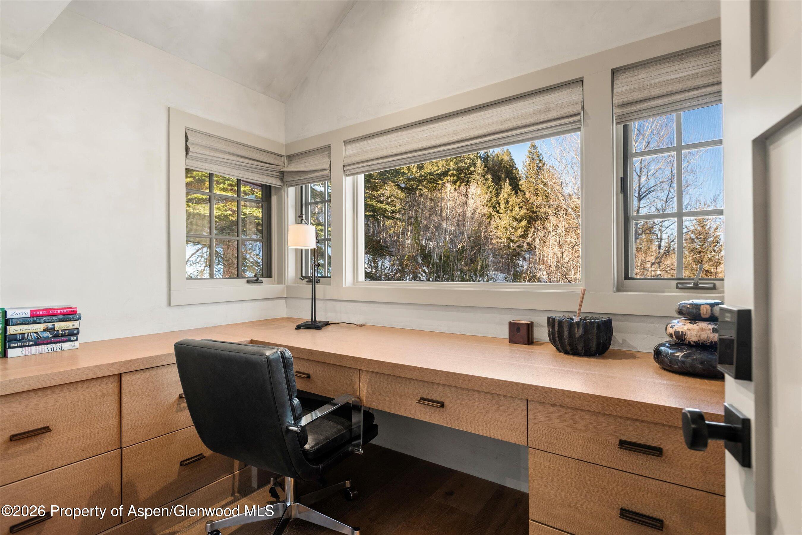 1271 Ute Avenue Aspen, CO 81611 - Photo 14 of 53 a kitchen with a window a sink and cabinets