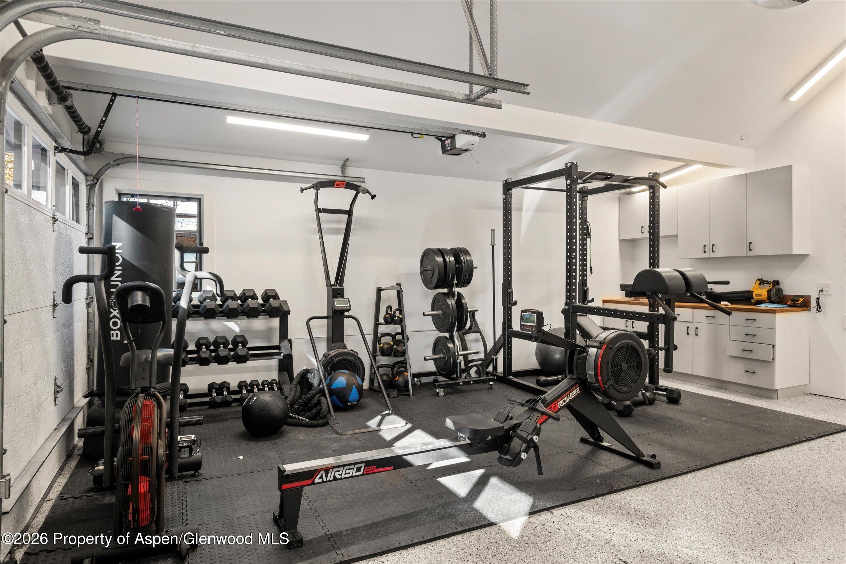 1271 Ute Avenue Aspen, CO 81611 - Photo 33 of 53 a view of a room with gym equipment