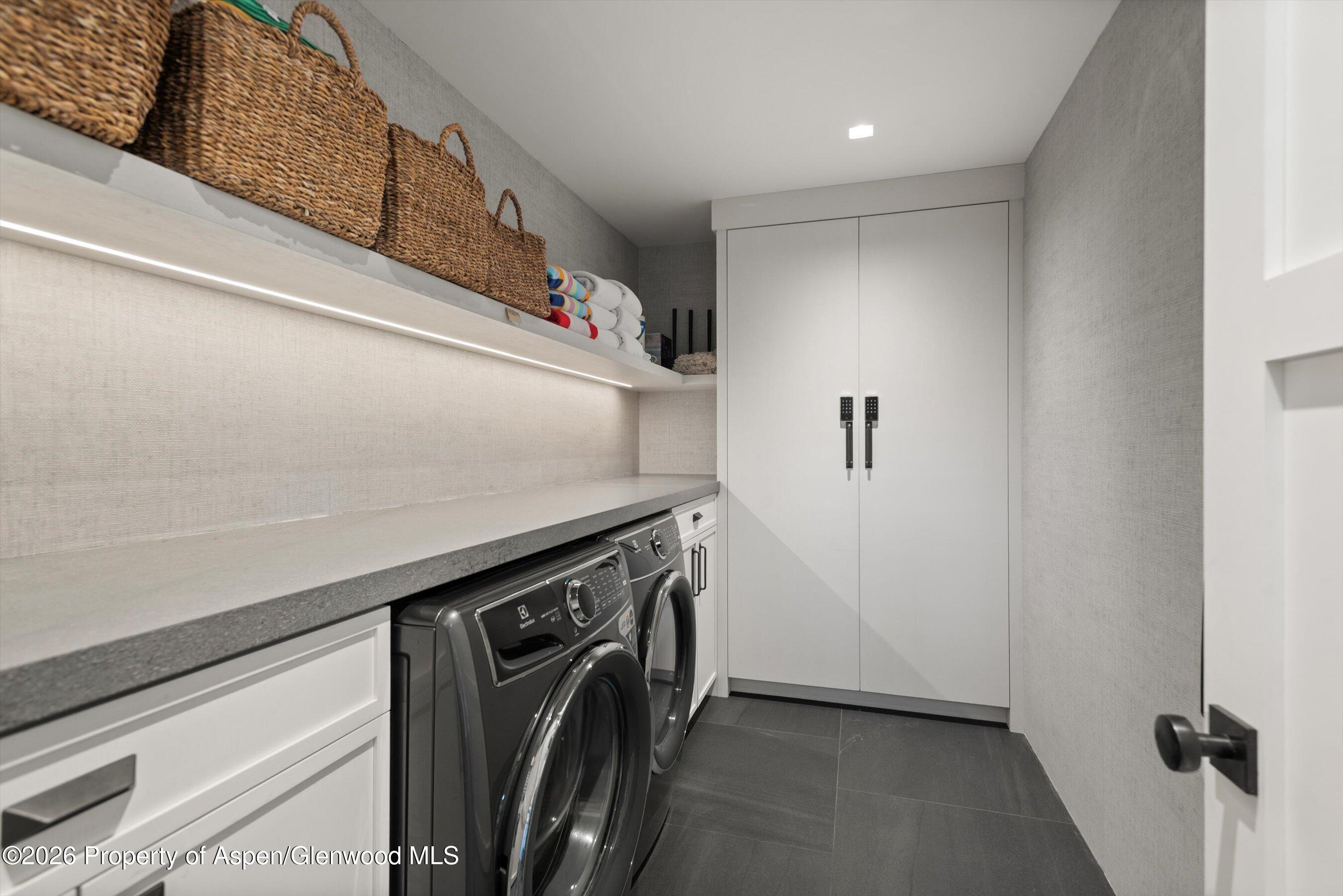 1271 Ute Avenue Aspen, CO 81611 - Photo 35 of 53 a utility room with dryer and washer
