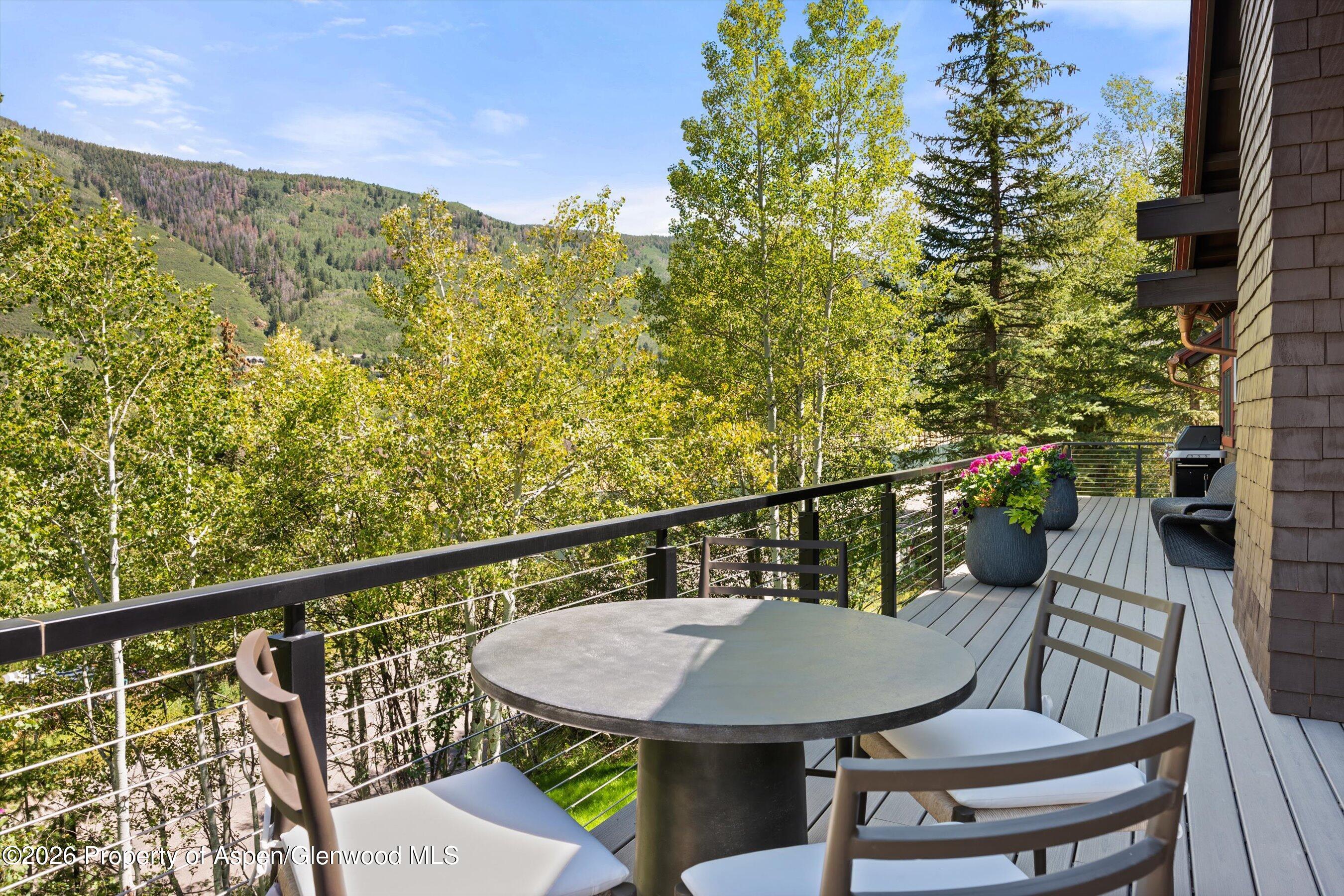 1271 Ute Avenue Aspen, CO 81611 - Photo 45 of 53 a view of a balcony dining area