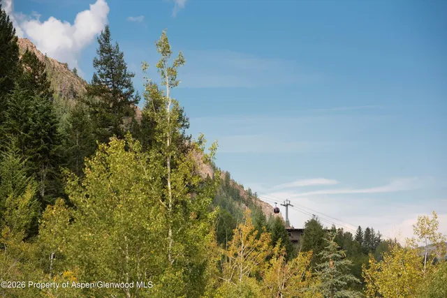 a kitchen that has a sink and a large window