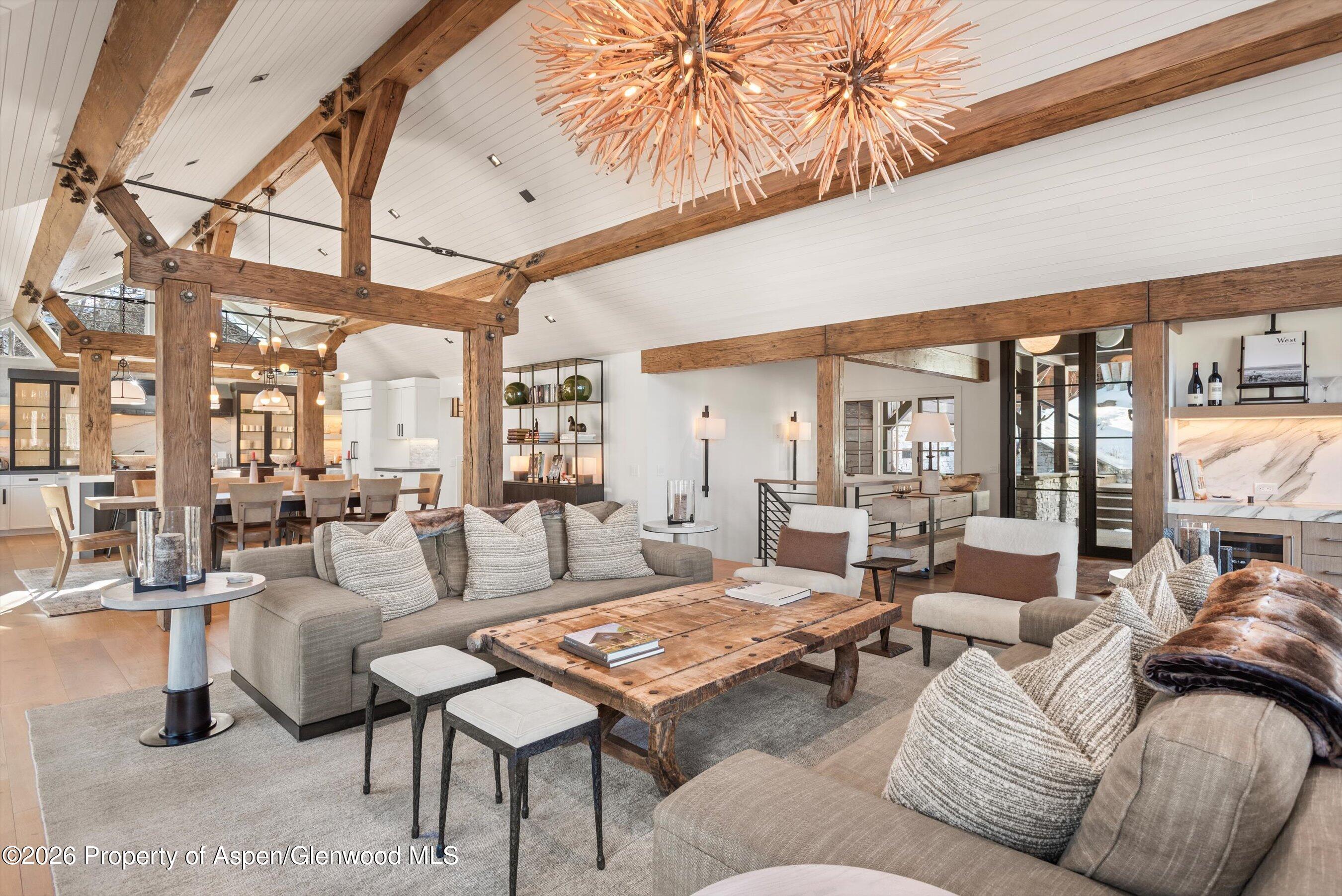 1271 Ute Avenue Aspen, CO 81611 - Photo 5 of 53 a living room with furniture a rug and a large window
