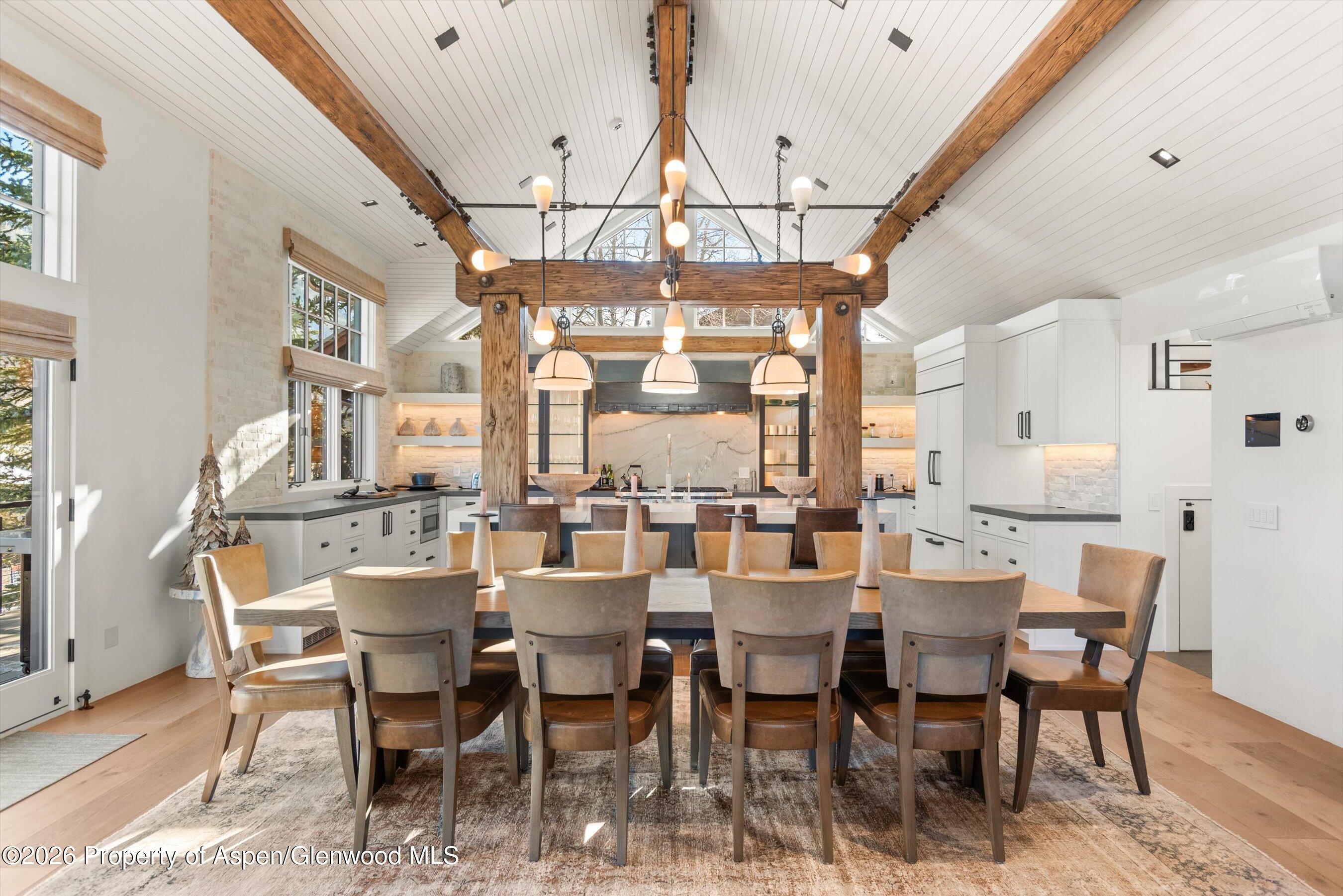 1271 Ute Avenue Aspen, CO 81611 - Photo 7 of 53 a view of a dining room with furniture window and wooden floor