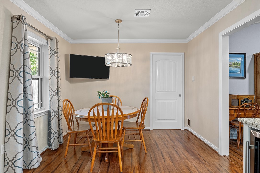 1929 Trinity Drive Waco, TX 76710 - Photo 9 of 22 a view of a dining room with furniture window and wooden floor