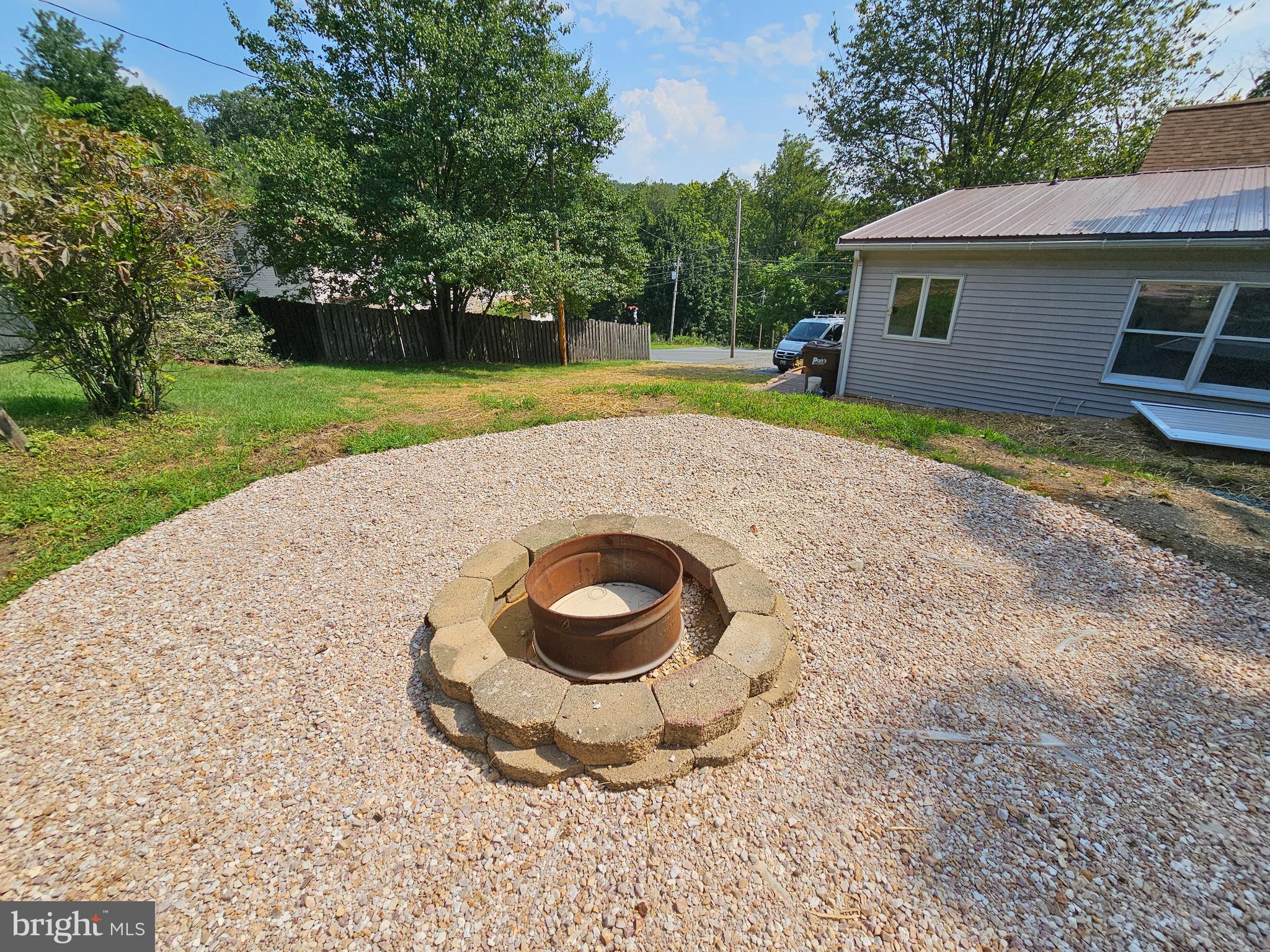 15165 Charmian Road Blue Ridge Summit, PA 17214 - Photo 18 of 21 Fire pit area behind the home