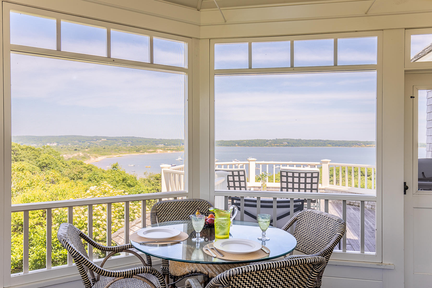 7 Clay Pit Road Aquinnah, MA 02535 - Photo 14 of 29 a view of a balcony with furniture and window