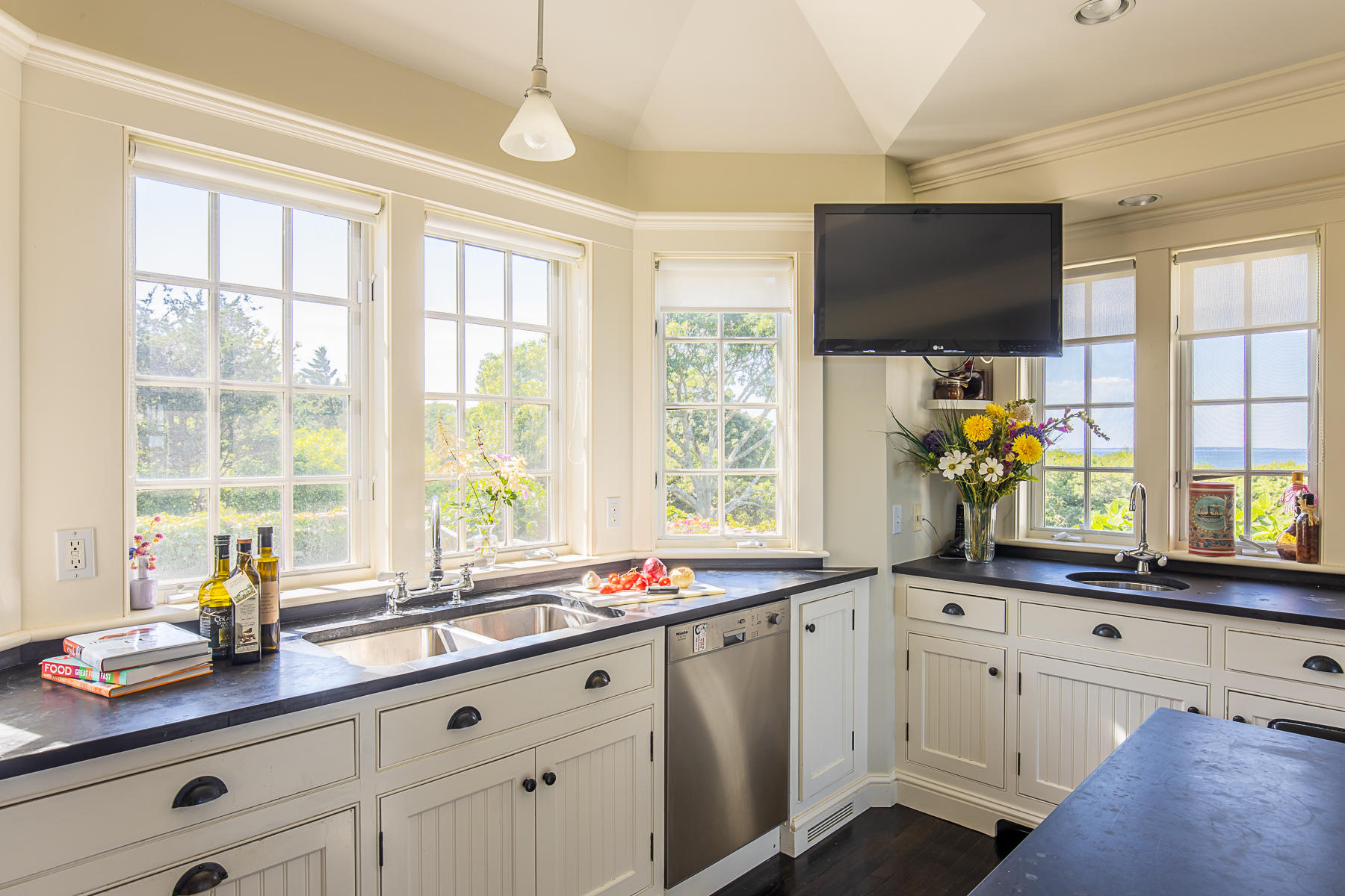 7 Clay Pit Road Aquinnah, MA 02535 - Photo 15 of 29 a kitchen with sink a window and appliances