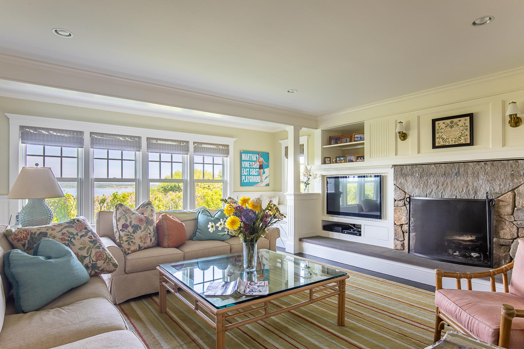 7 Clay Pit Road Aquinnah, MA 02535 - Photo 20 of 29 a living room with furniture a flat screen tv and a fireplace