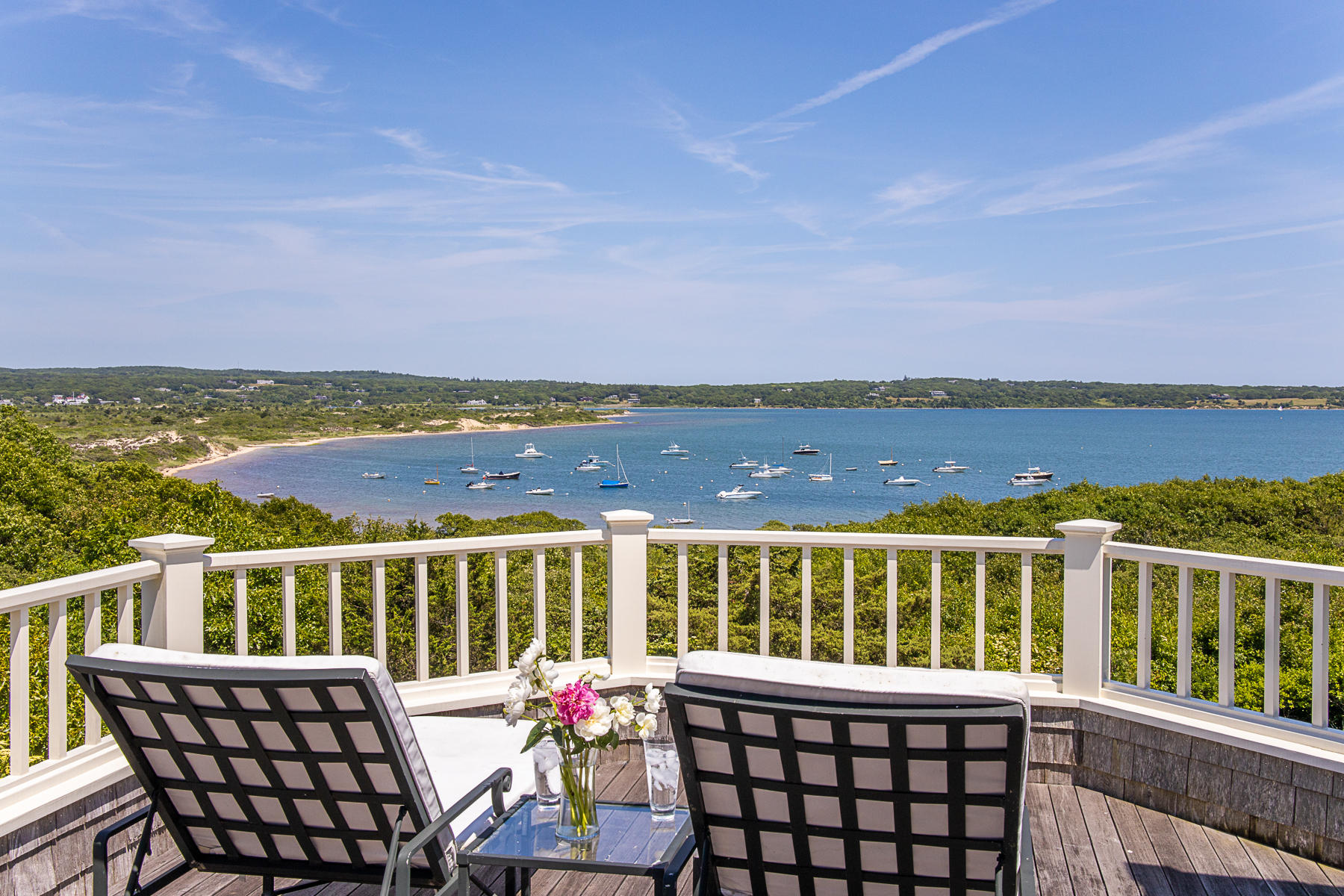 7 Clay Pit Road Aquinnah, MA 02535 - Photo 2 of 29 a view of a patio with a table and chairs