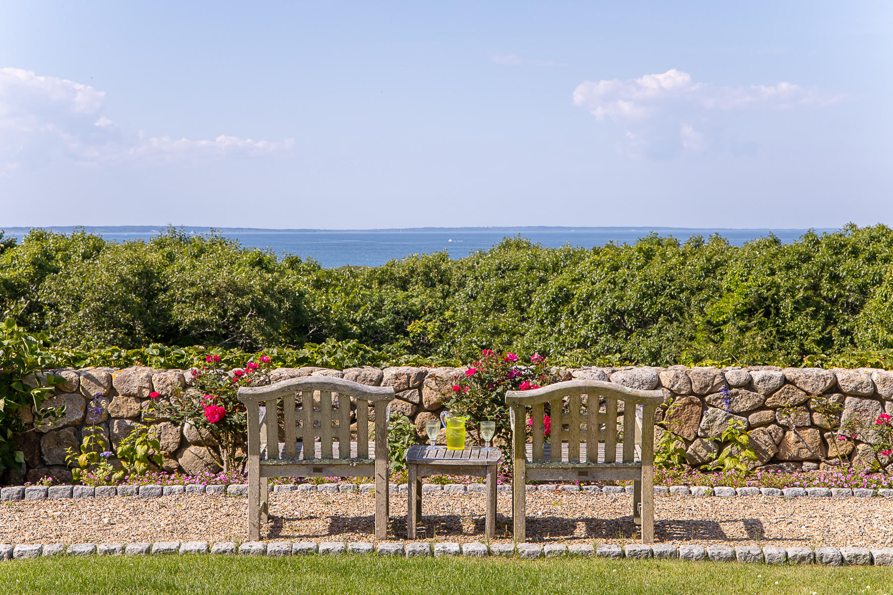 7 Clay Pit Road Aquinnah, MA 02535 - Photo 29 of 29 a view of an chairs and table in the yard