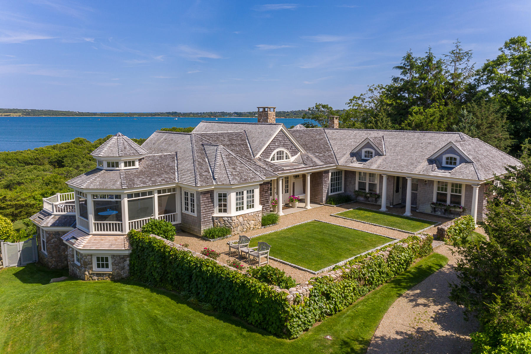 7 Clay Pit Road Aquinnah, MA 02535 - Photo 3 of 29 a front view of a house with a garden
