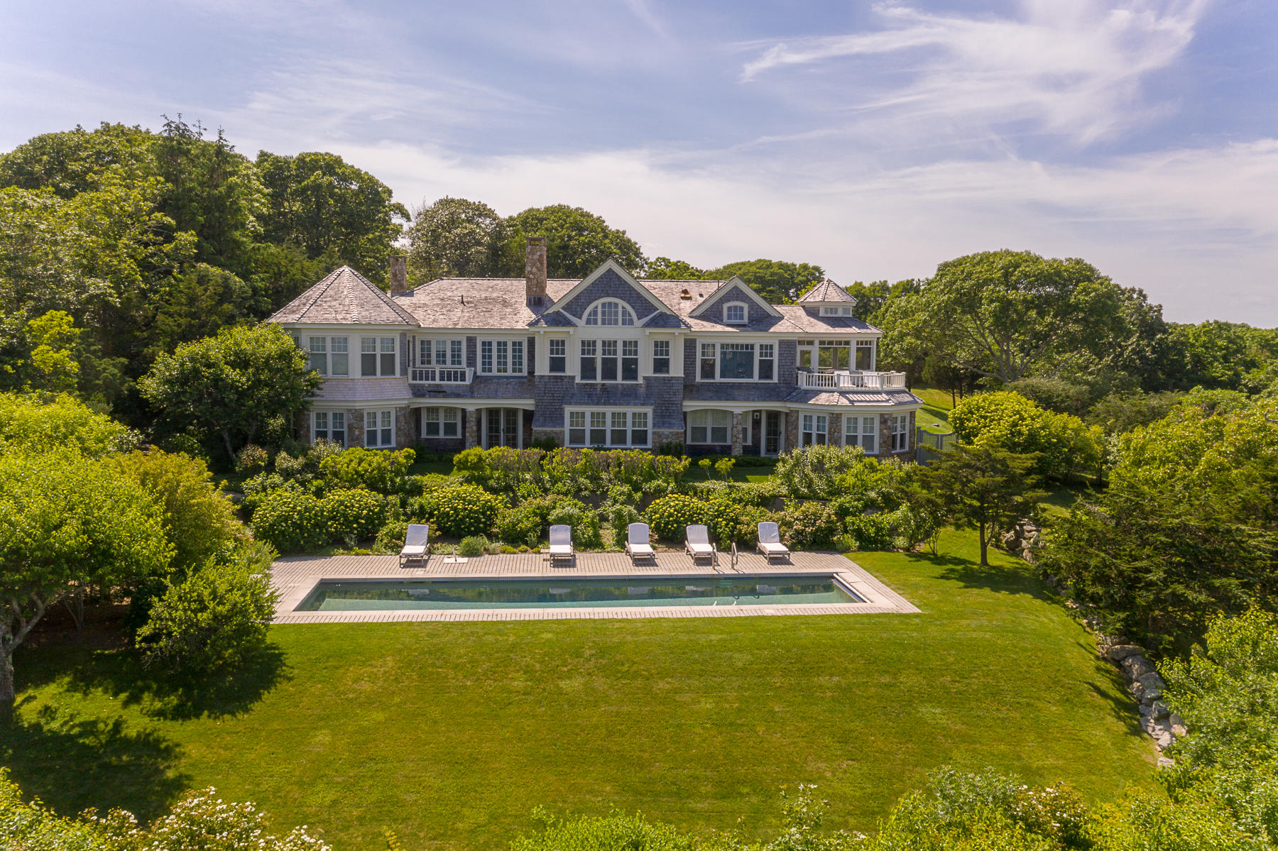 7 Clay Pit Road Aquinnah, MA 02535 - Photo 5 of 29 a large body of water with a building in the background