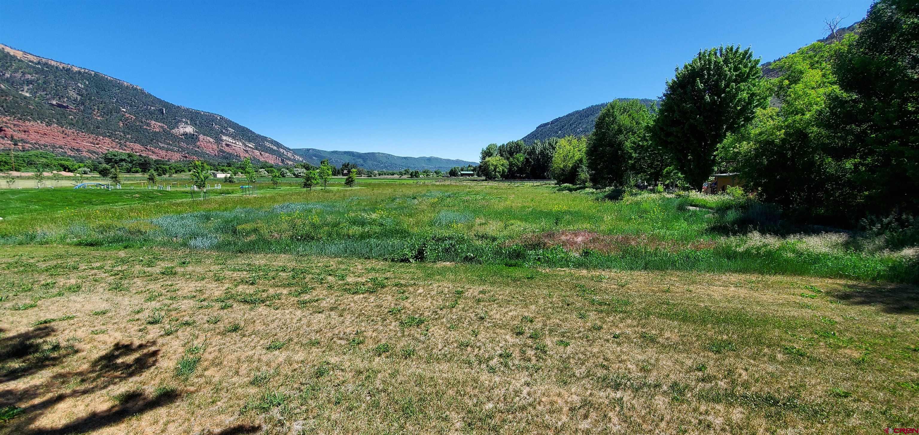 80 Twilight Trails Circle Durango, CO 81301 - Photo 23 of 26 a view of a field with grass and trees