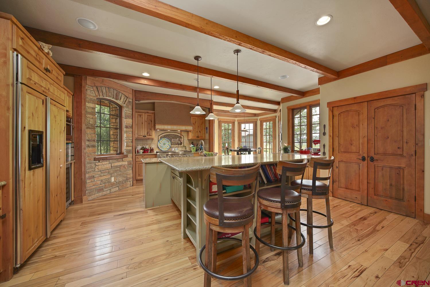 80 Twilight Trails Circle Durango, CO 81301 - Photo 5 of 26 a view of a dining room with furniture and wooden floor
