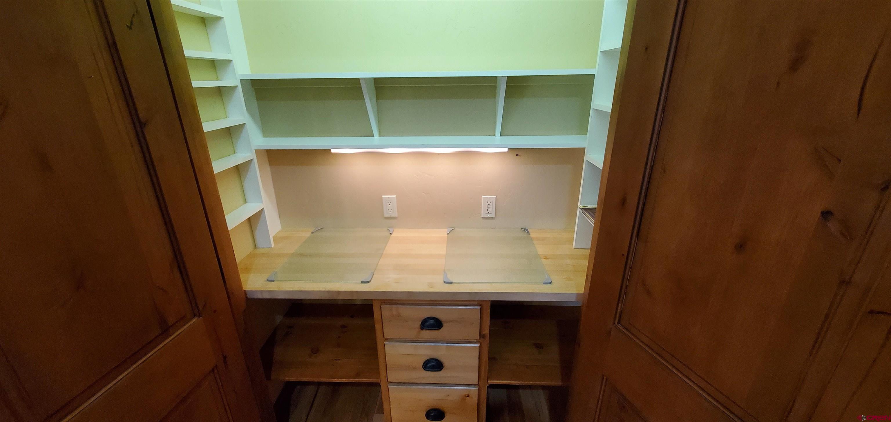 80 Twilight Trails Circle Durango, CO 81301 - Photo 10 of 26 a view of wooden floor and cabinet