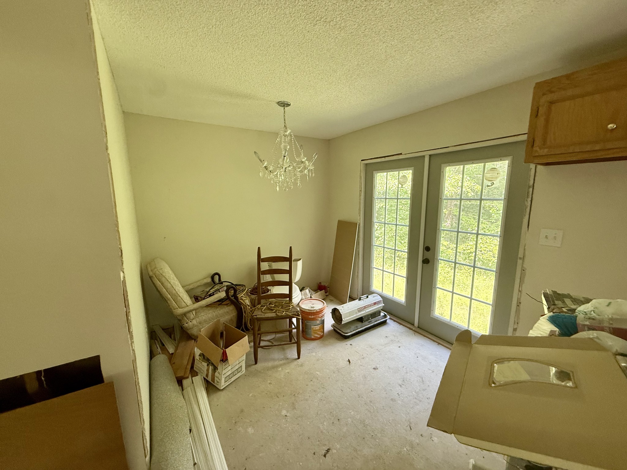 228 Henryville Road Ethridge, TN 38456 - Photo 54 of 55 a bedroom with a bed and wooden floor