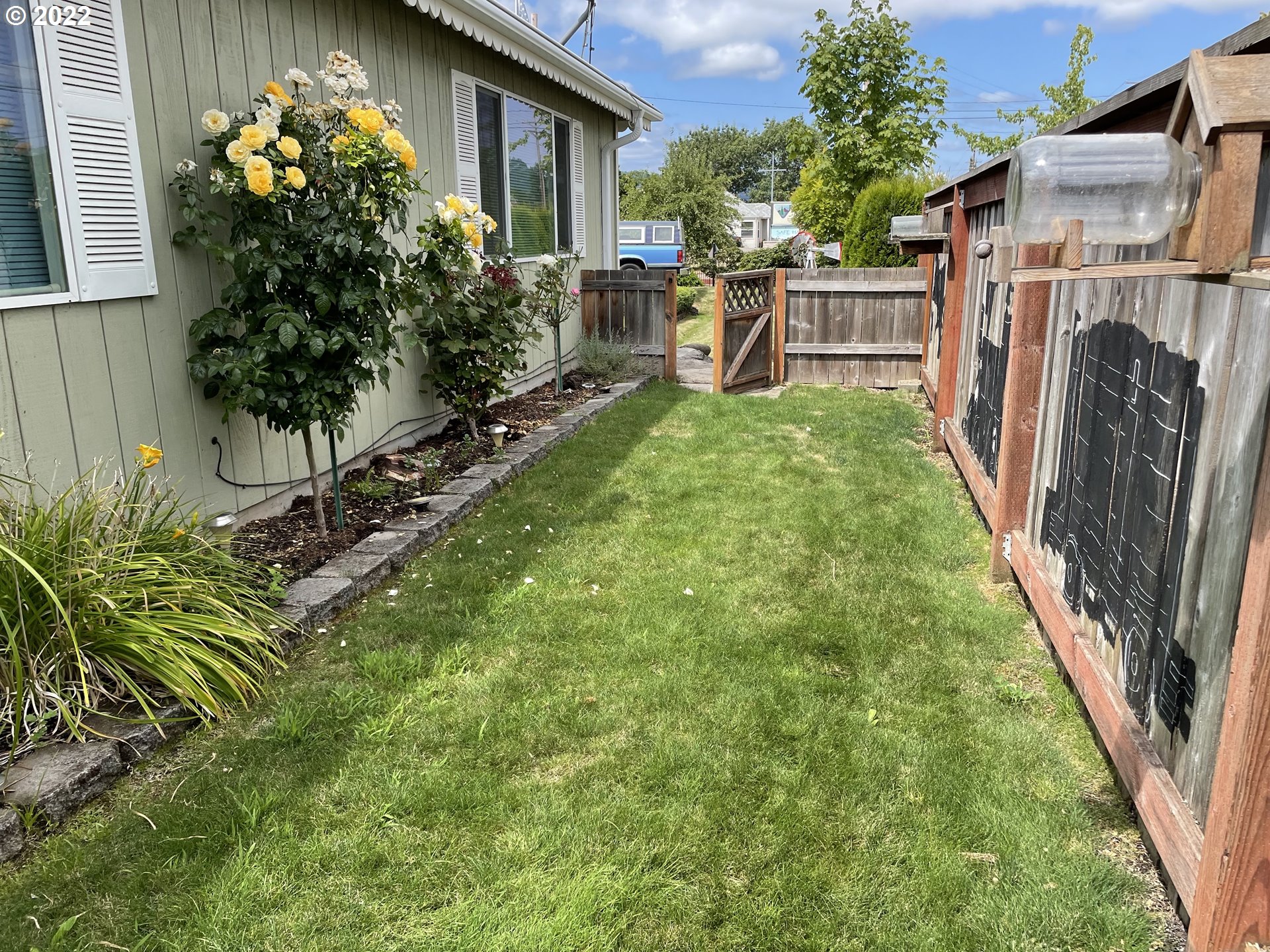 246 South 42nd Street Springfield, OR 97478 - Photo 5 of 9 a view of a house with backyard and sitting area