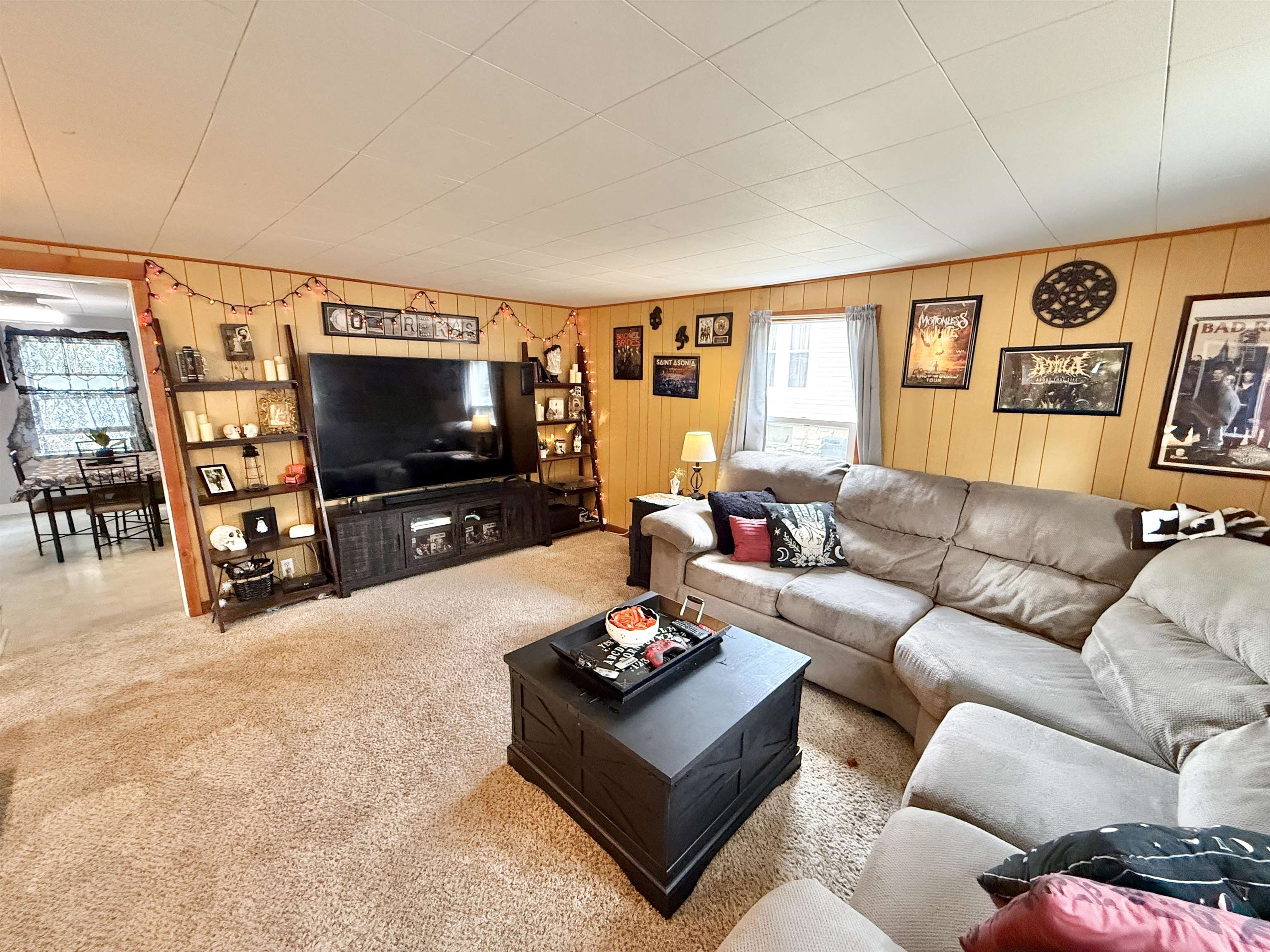 503 South 3rd Street Oregon, IL 61061 - Photo 6 of 22 a living room with furniture and a flat screen tv