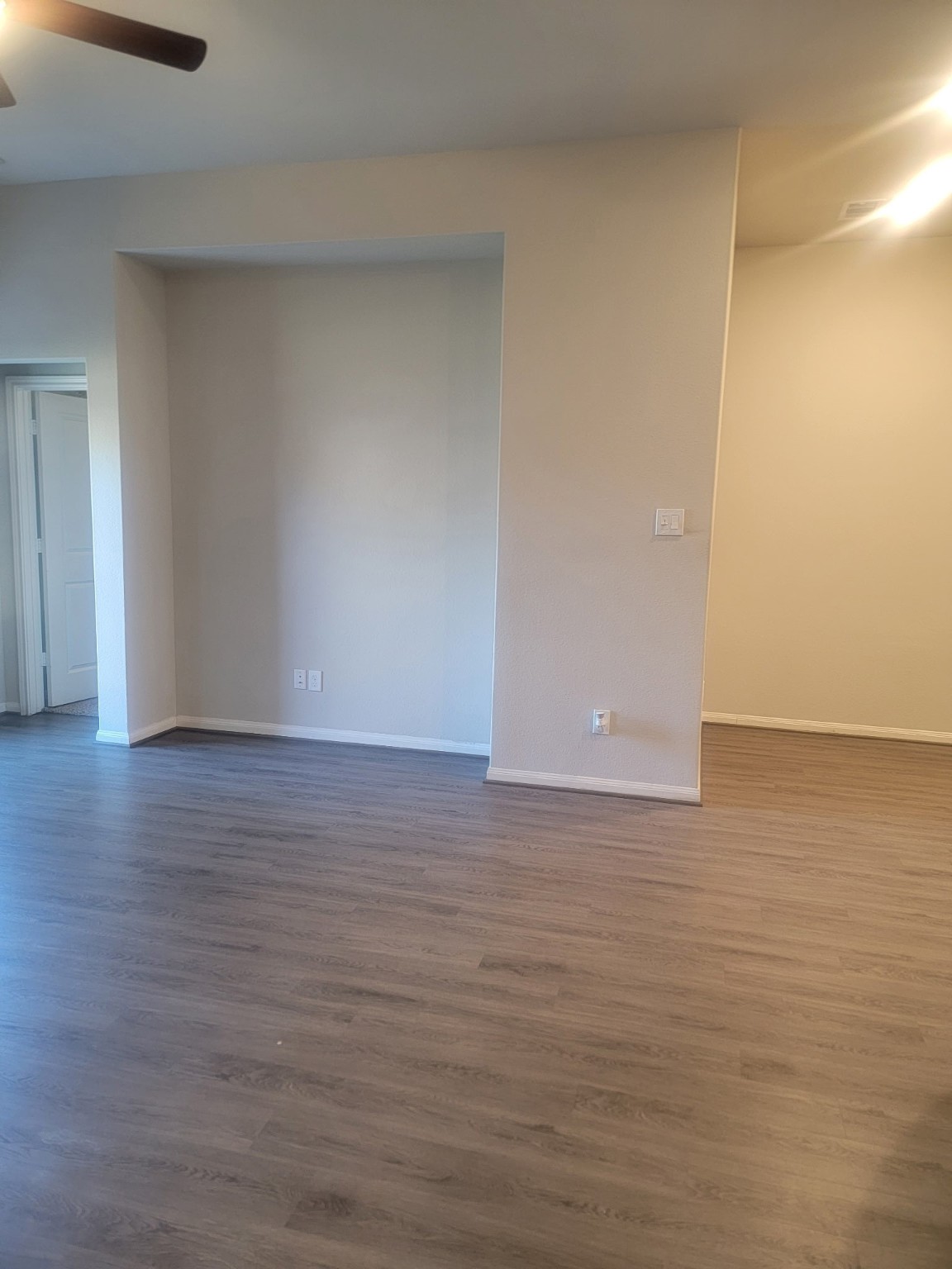 1406 Munson Valley Road Richmond, TX 77406 - Photo 11 of 27 a view of an empty room with wooden floor
