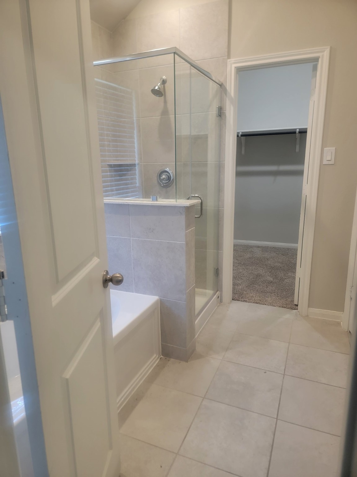 1406 Munson Valley Road Richmond, TX 77406 - Photo 16 of 27 a bathroom with a bathtub and a sink