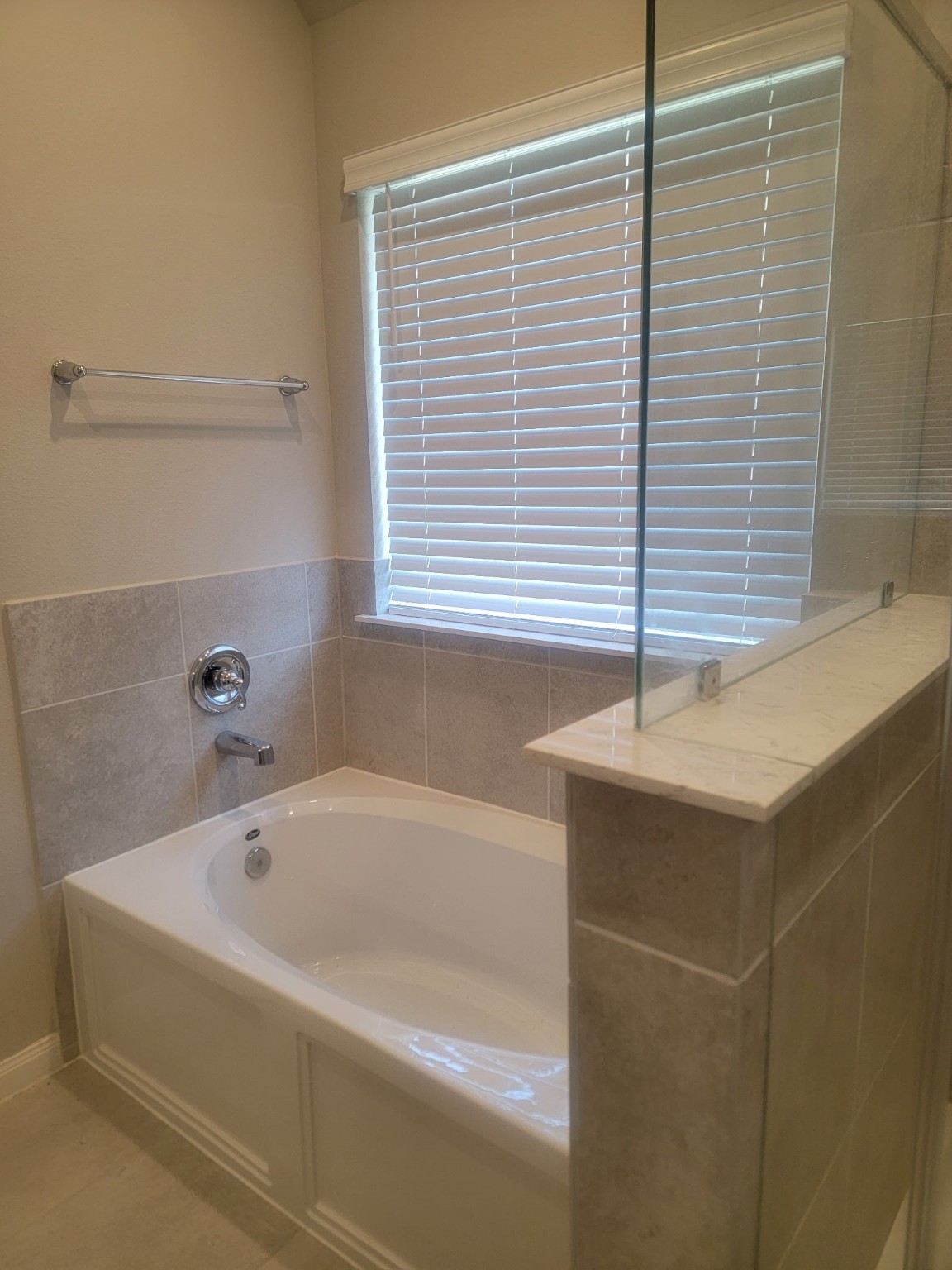 1406 Munson Valley Road Richmond, TX 77406 - Photo 17 of 27 a bathroom with a bathtub and a shower
