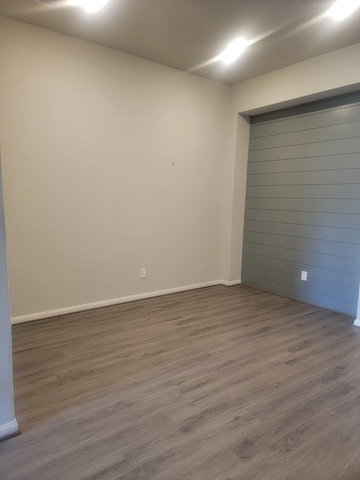 1406 Munson Valley Road Richmond, TX 77406 - Photo 20 of 27 an empty room with wooden floor