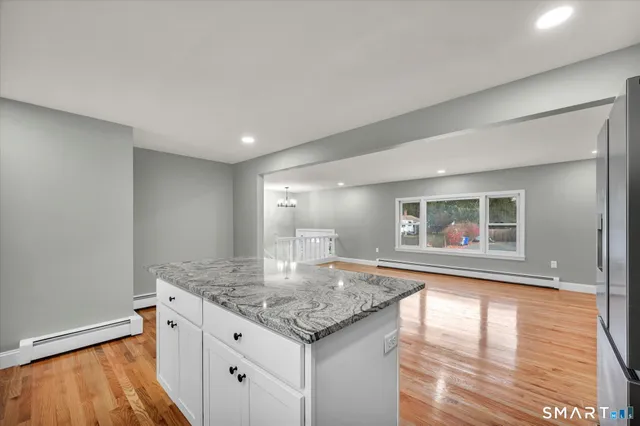 a kitchen with granite countertop sink and granite counter tops