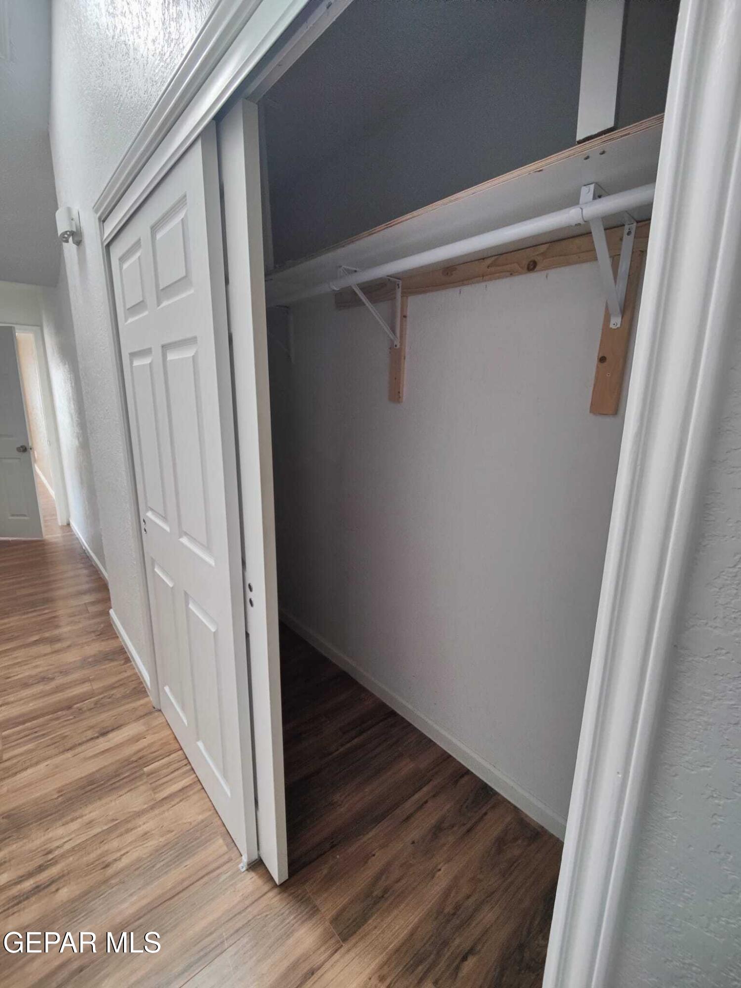 1639 Brian Ray Circle El Paso, TX 79936 - Photo 52 of 52 a view of a hallway with wooden floor and staircase