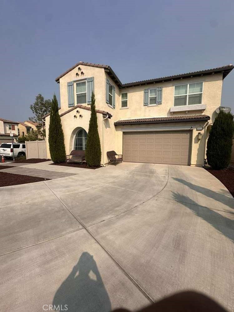 39552 Strada Scala Lake Elsinore, CA 92532 - Photo 1 of 40 a view of a house with a patio