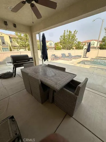 a view of living room with furniture and window