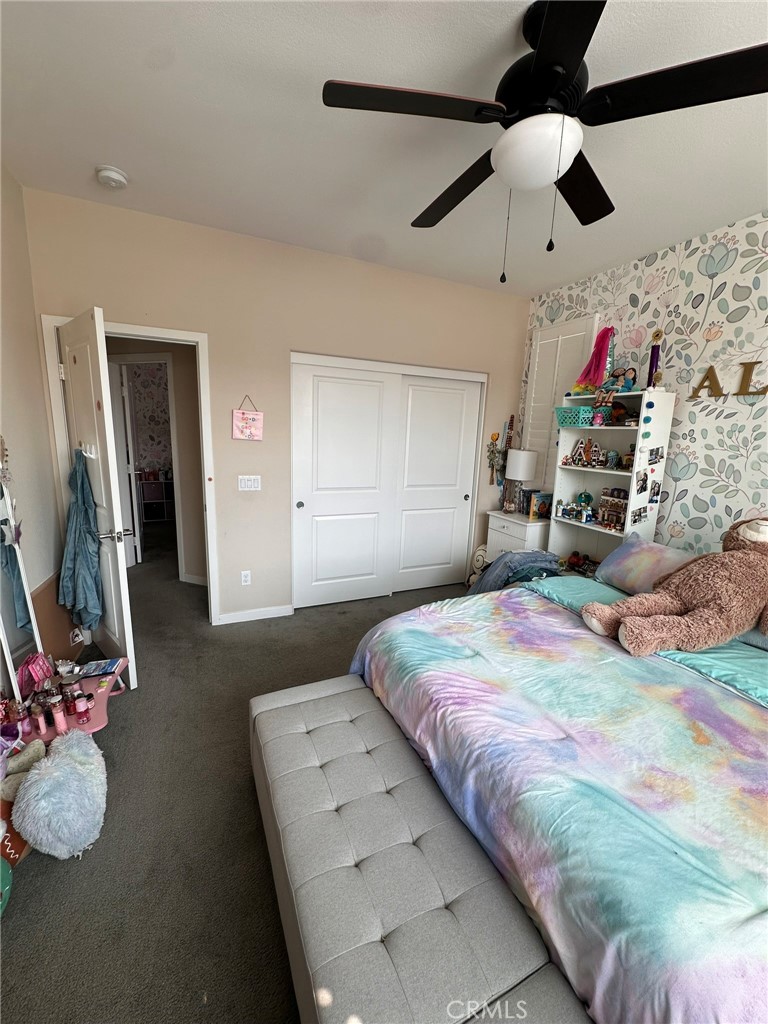 39552 Strada Scala Lake Elsinore, CA 92532 - Photo 30 of 40 a bedroom with bed and window