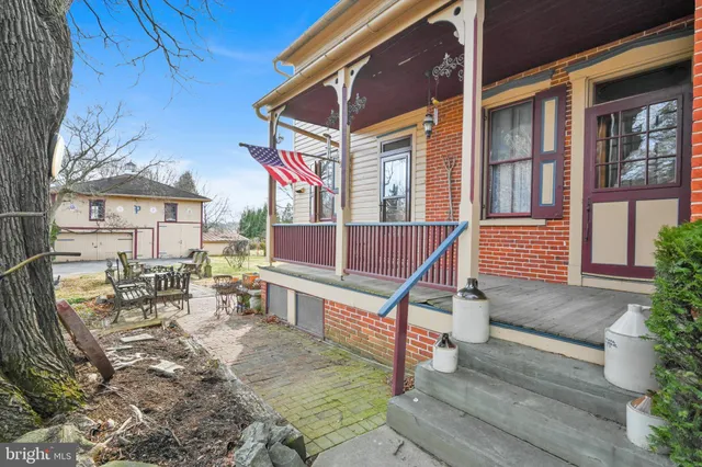 a front view of a house with street