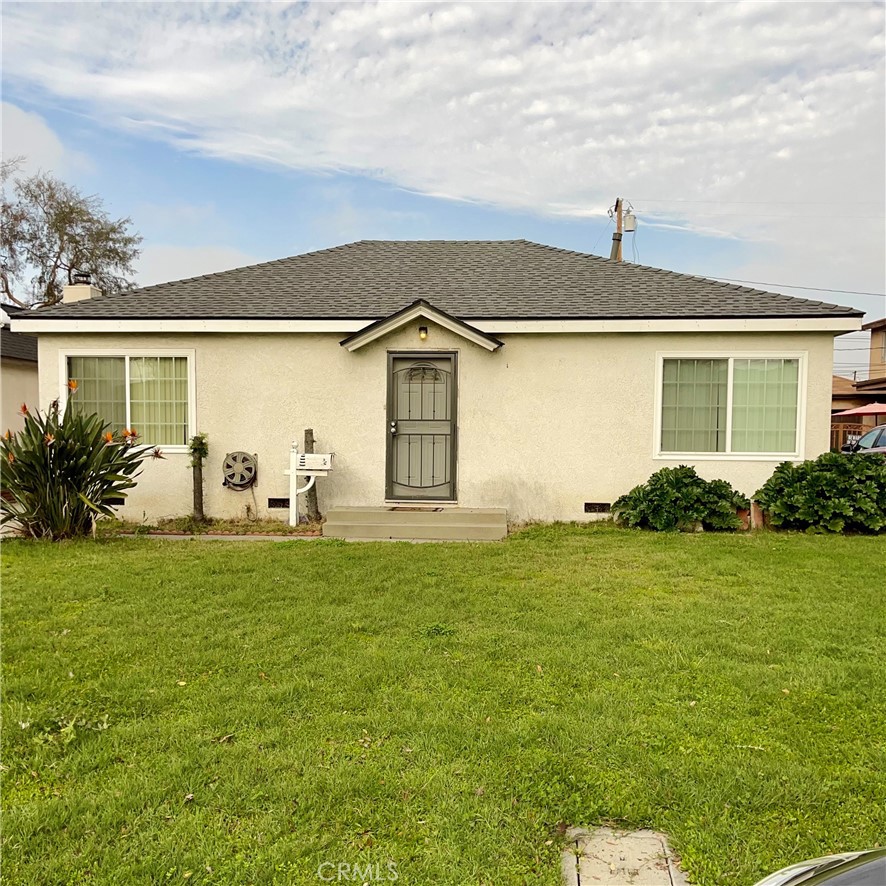 12347 Horley Avenue Downey, CA 90242 - Photo 1 of 1 front view of a house with a yard