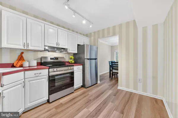 $355,000 | 11735 Ledura Court, Unit T1, Reston, VA 20191