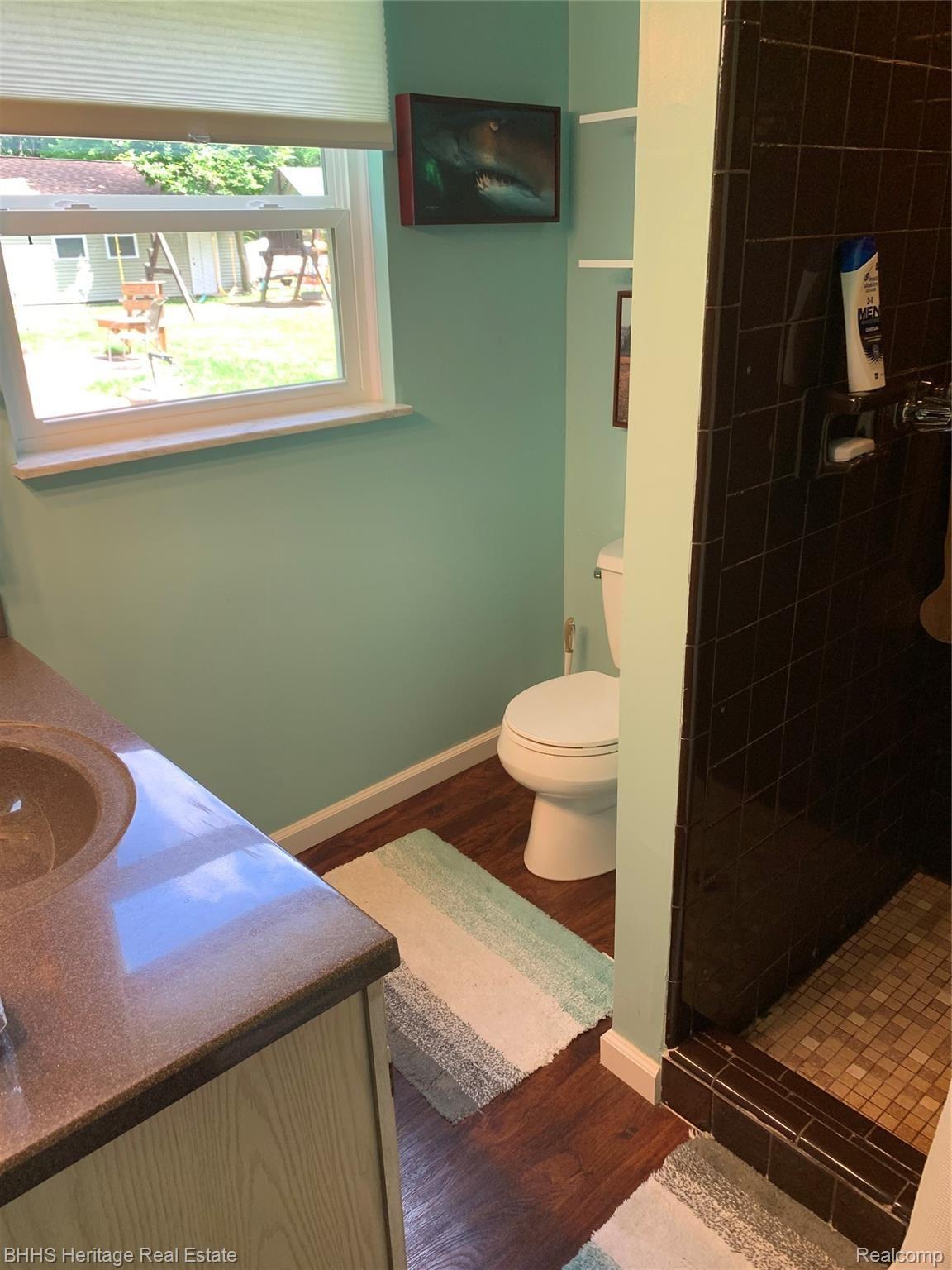 2413 Hunter Road Brighton, MI 48114 - Photo 35 of 42 LOWER LEVEL FULL BATH