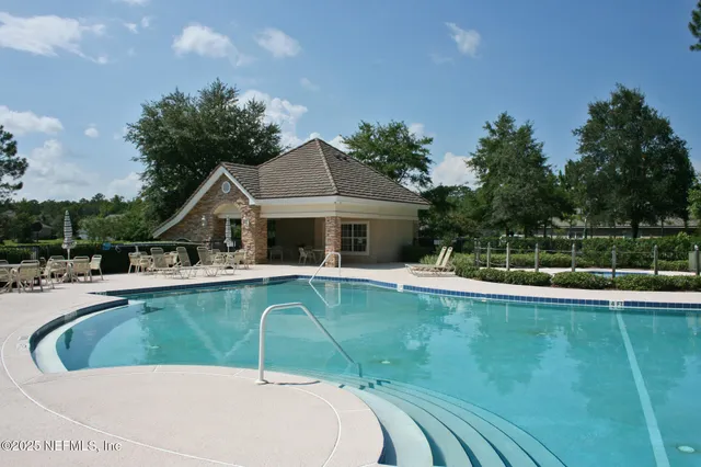 a view of a house and pool
