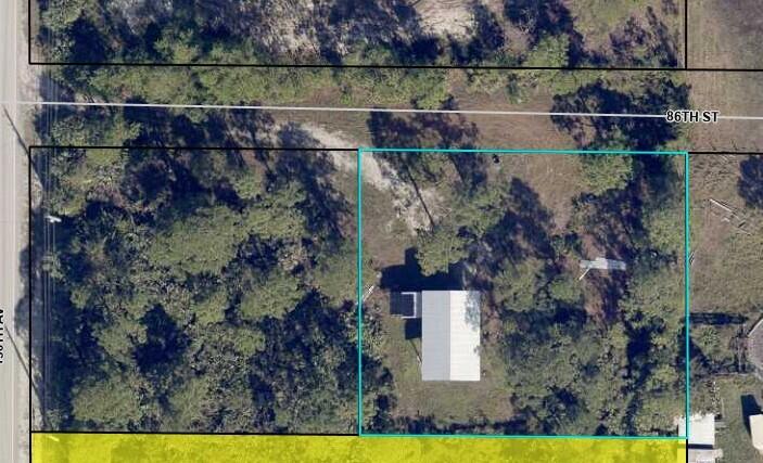 12885 86th Street Fellsmere, FL 32948 - Photo 2 of 3 an aerial view of a house with a yard