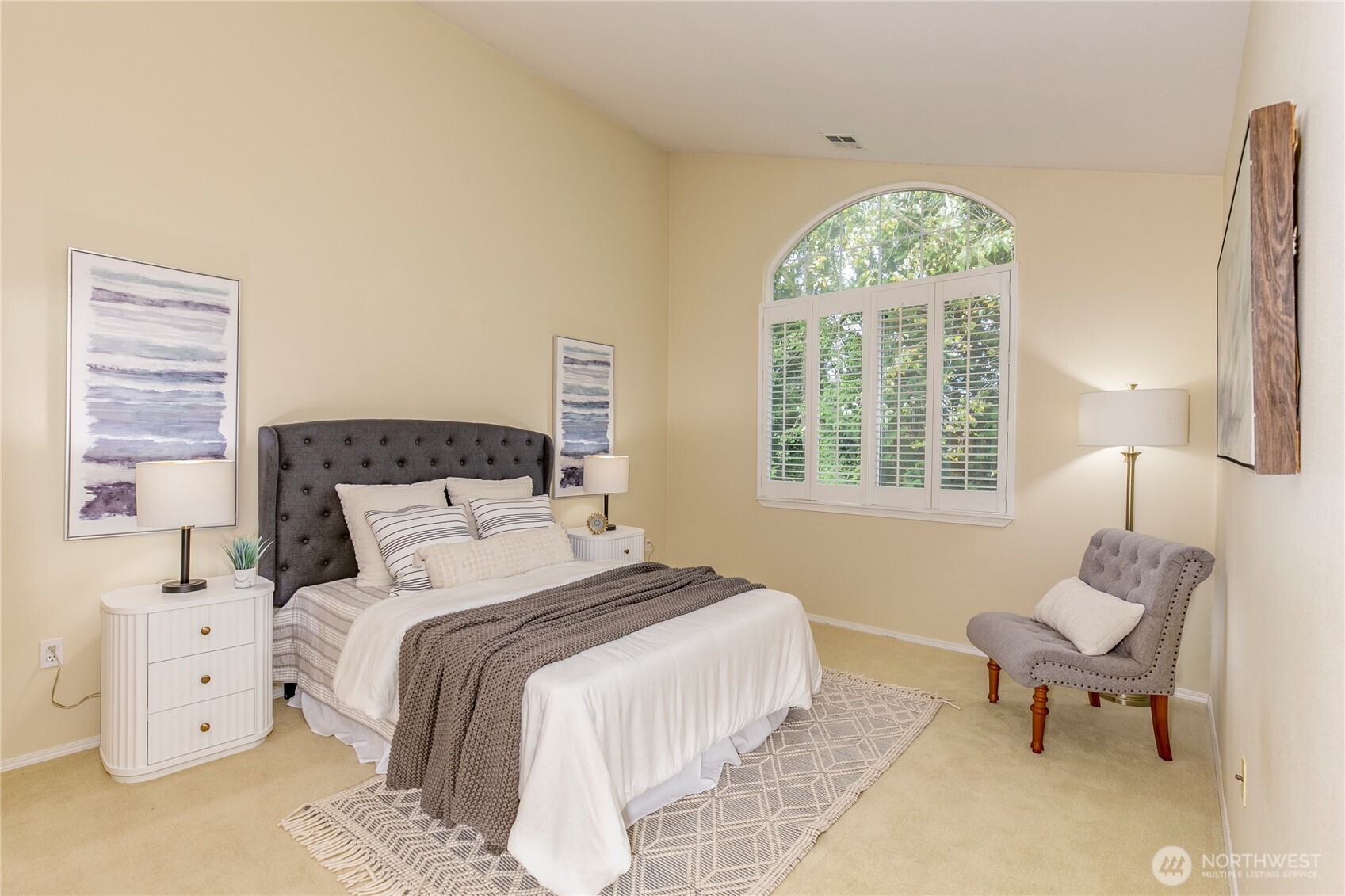 5500 Harbour Pointe Boulevard, Unit B202 Mukilteo, WA 98275 - Photo 12 of 30 a bedroom with furniture and a large window