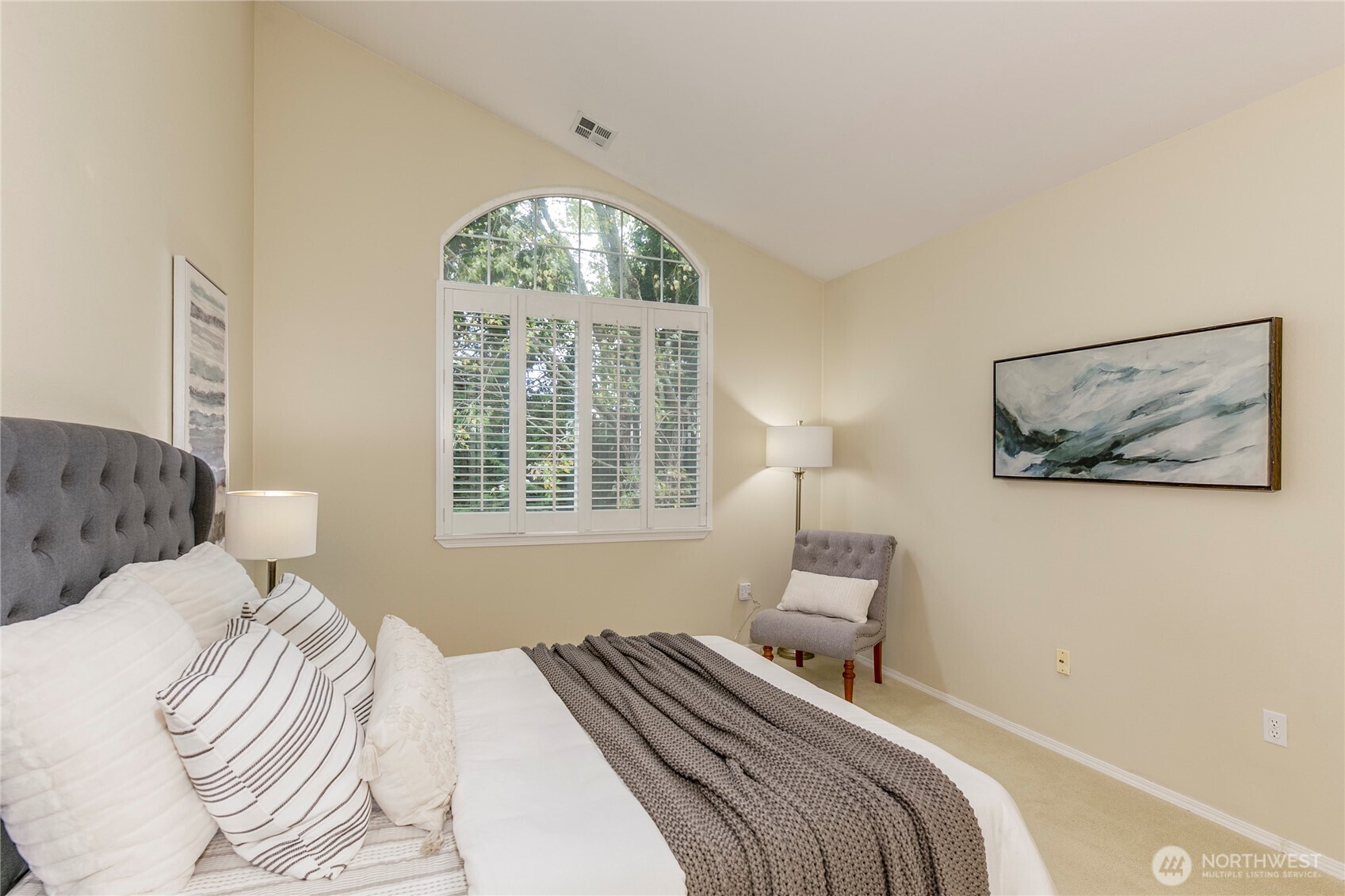 5500 Harbour Pointe Boulevard, Unit B202 Mukilteo, WA 98275 - Photo 13 of 30 a bedroom with a bed and a window