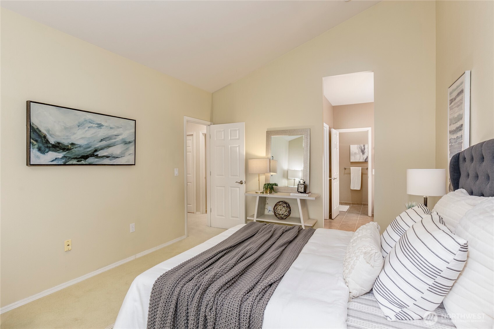 5500 Harbour Pointe Boulevard, Unit B202 Mukilteo, WA 98275 - Photo 14 of 30 a bedroom with a bed and a lamp