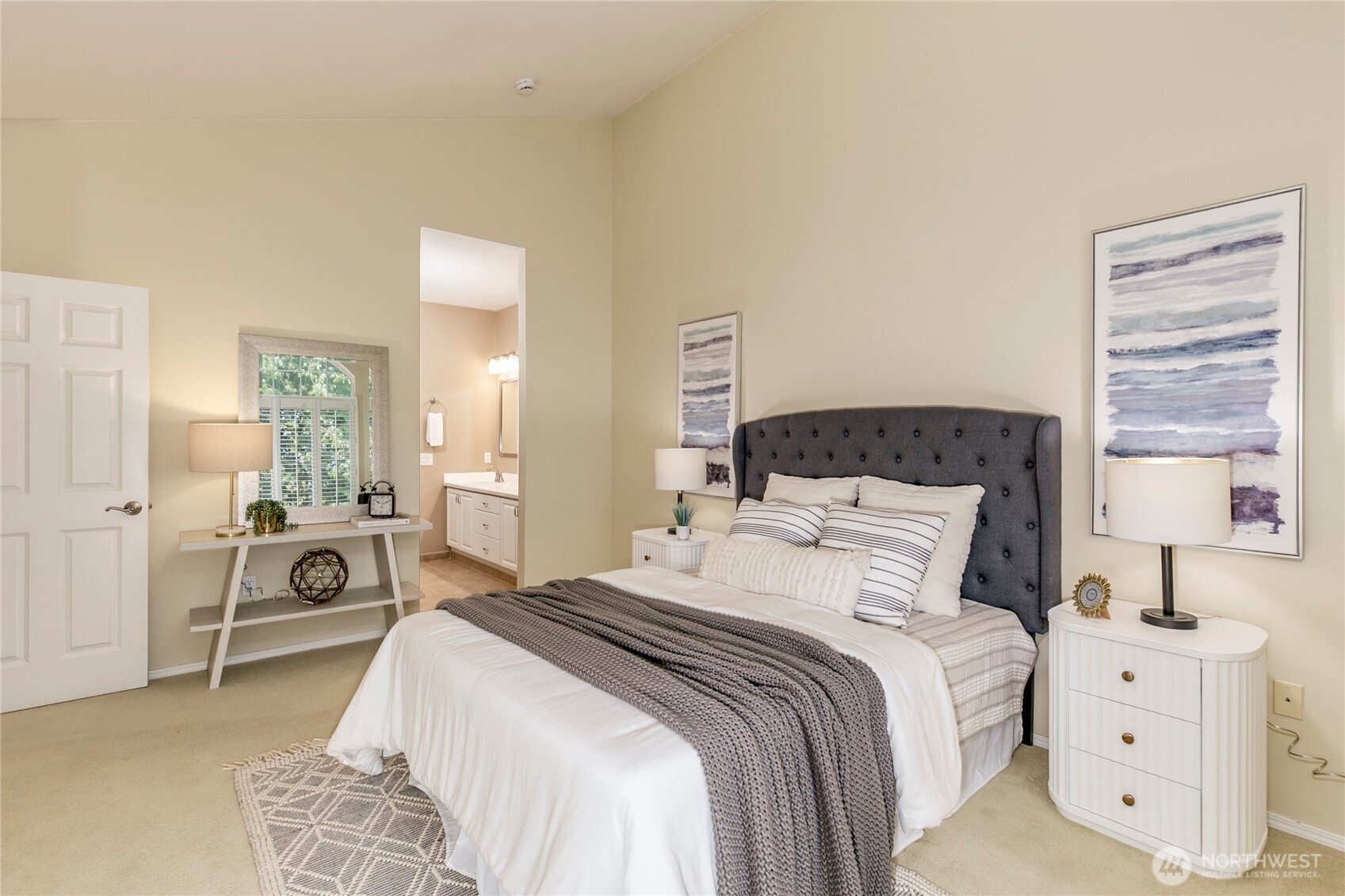 5500 Harbour Pointe Boulevard, Unit B202 Mukilteo, WA 98275 - Photo 15 of 30 a bedroom with a bed and a window